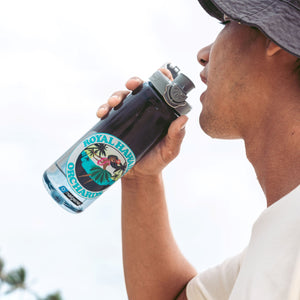 man holding nalgene bottle with hula dancer design to his mouth